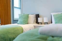 Charlotte House: Central 2BR 2BATH Retreat – Sleeps 6 - Image 4