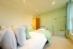 Charlotte House: Central 2BR 2BATH Retreat – Sleeps 6 - Image 5