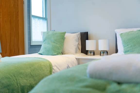 Charlotte House: Central 2BR 2BATH Retreat – Sleeps 6 - Image 4
